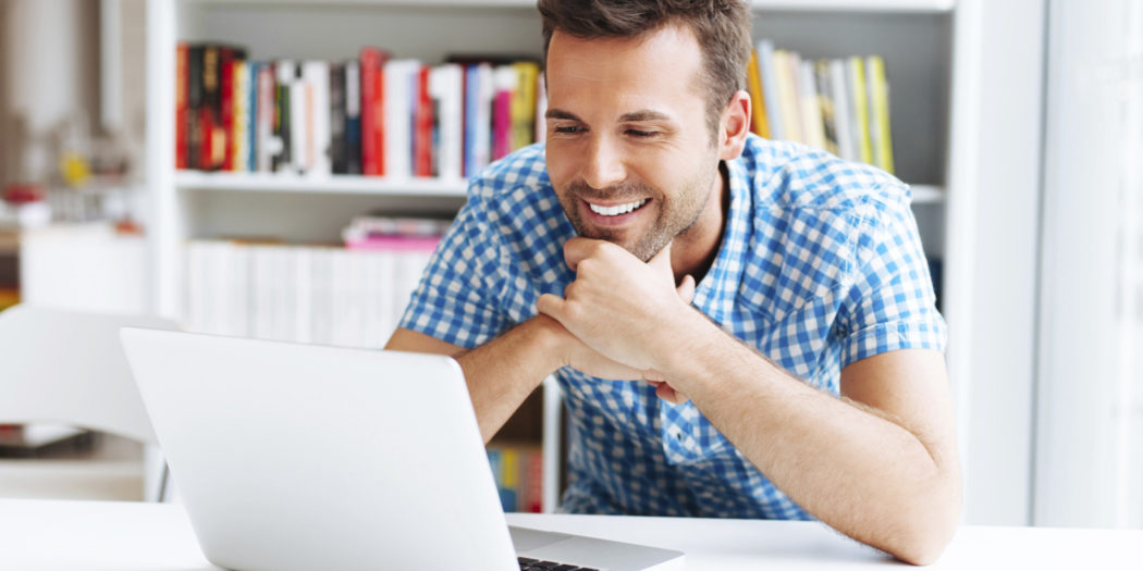 Man sitting in front of computer